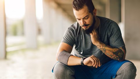 Man checking pulse